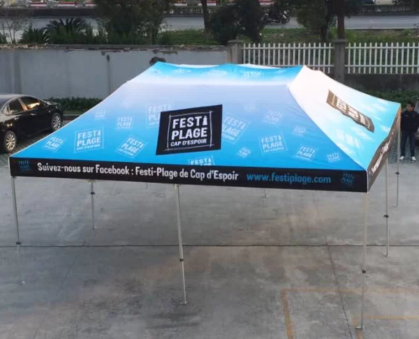 BLUE AND WHITE 20X20 TENT WITH BLACK VALANCE