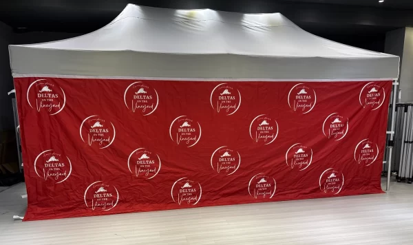 TENT WALL WITH STEP AND REPEAT DESIGN